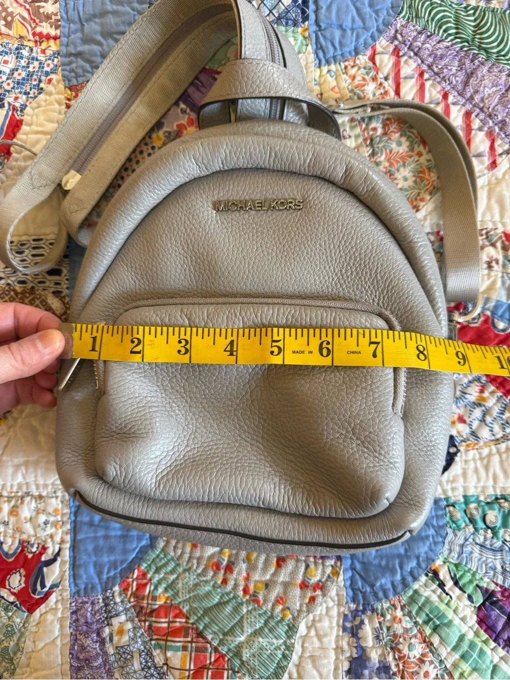 Michael Kors Pebbled Leather Mini Backpack in Light Gray with Gold Hardware